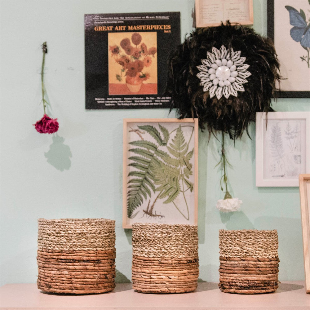 Two-tone brown and beige woven seagrass and banana fibre basket