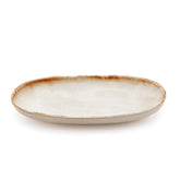 White stoneware oval plate with gold accent