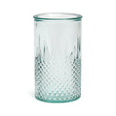 Clear glass tumbler with diamond pattern on a white background