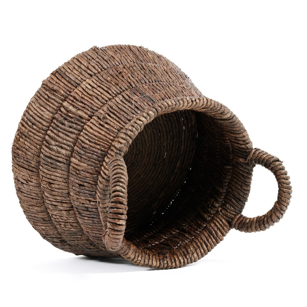 Brown woven banana leaf basket with handles