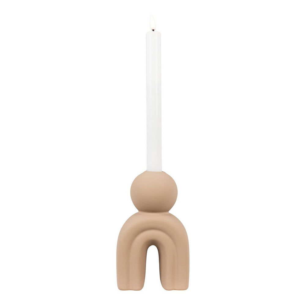 Beige pendant light with a white candle on a white background
