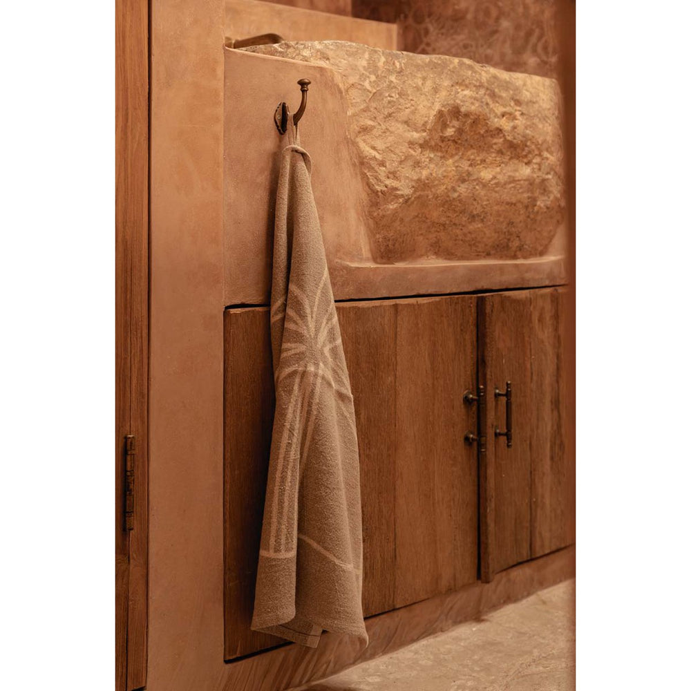 Natural white linen kitchen towel with palm tree print