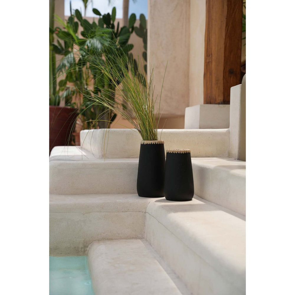 Black terracotta vase with natural raffia trim