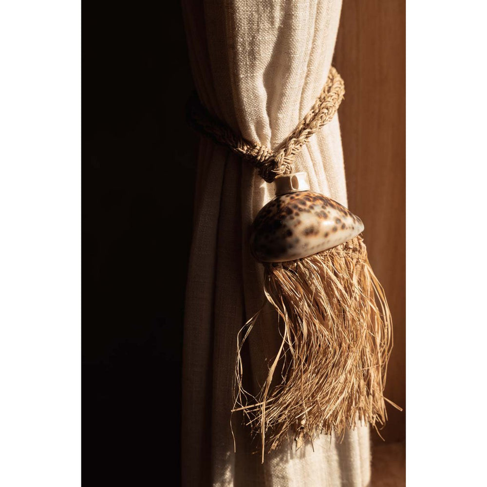 Natural raffia tassel with shell accent