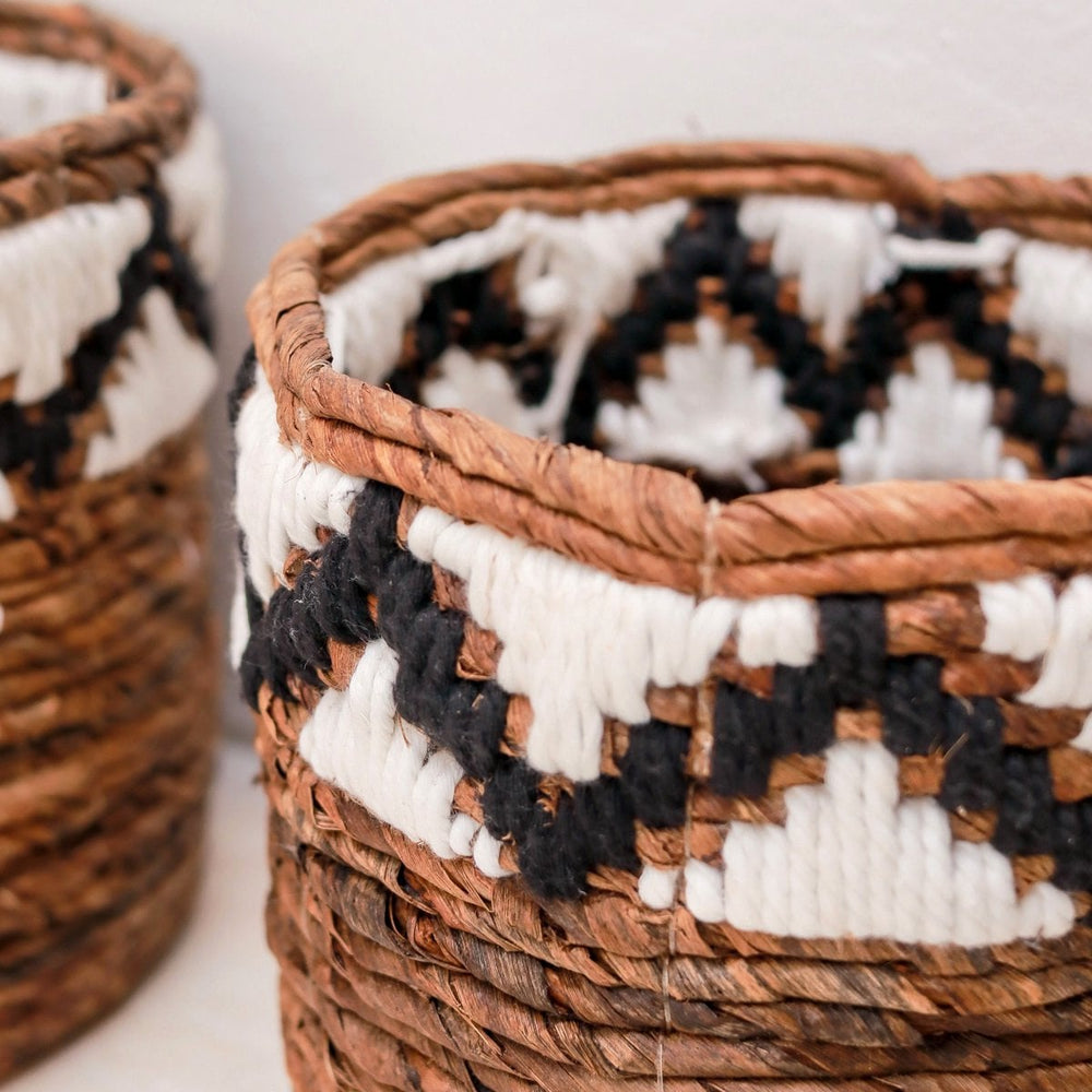 Brown woven banana fibre basket with zigzag pattern