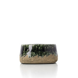 Green stoneware bowl planter with concrete-look finish