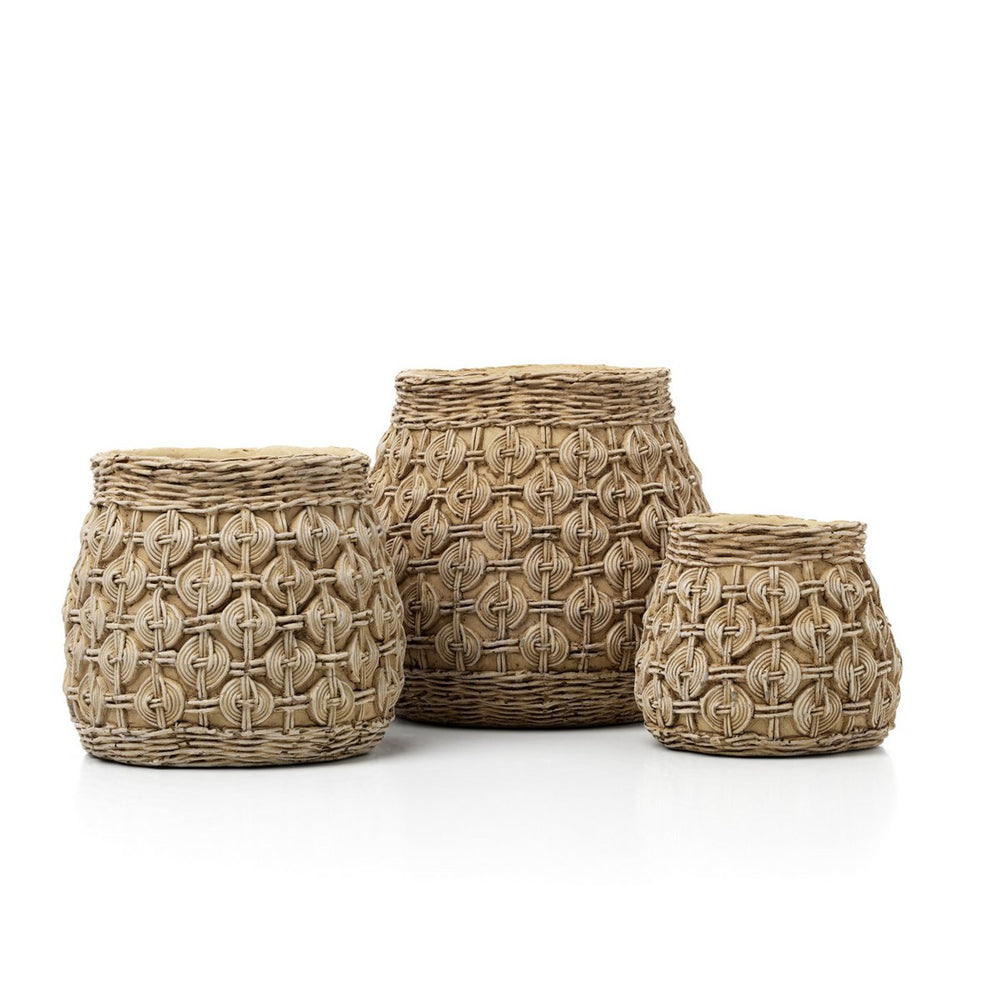 Three woven baskets of different sizes on a white background